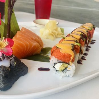 Fukutoku - Shogun roll: tempura red snapper, avocado, cream cheese, topped with spicy tuna, sliced jalapeño & spicy eel sauce. Salmon sashimi - Japanese Near Me - Mt. Juliet, Tennessee