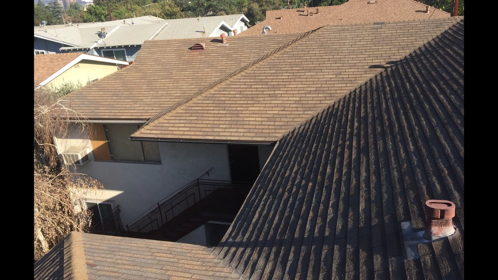 Slide of Ruiz Roofing Construction