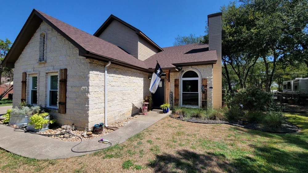 Slide of Lone Star Roofing & Gutters