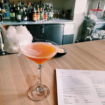 Sanjusan - Mican cocktail - FUTURE GIN, TANGERINE, APEROL, DRY CURACAO, MANDARIN CLOUD - Pizza Near Me - Minneapolis, Minnesota Sanjusan - Mican cocktail - FUTURE GIN, TANGERINE, APEROL, DRY CURACAO, MANDARIN CLOUD - Pizza Near Me - Minneapolis, Minnesota