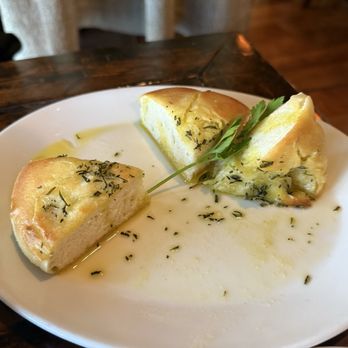 MiNGO - The house bread a delectable near focaccia but more tender situation - Italian Near Me - Beaverton, Oregon MiNGO - The house bread a delectable near focaccia but more tender situation - Italian Near Me - Beaverton, Oregon