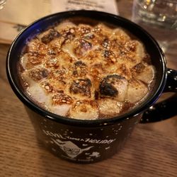 Devil Takes a Holiday - Hot Buttered YUM. Delicious! Absolutely get this. Rum, marshmallows, brownie bits at the bottom, with a spoon. Has non-alcoholic version.