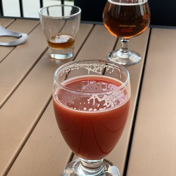 Porch Growler - two glasses of beer on a wooden table - Beer Bar Near Me - Worthington, Ohio