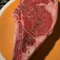 Friendly Nick’s Butcher - Inch and a quarter ribeye. So beautiful ready for grill.