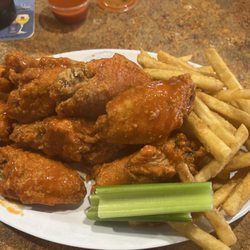 The Inn Between - Wings in hot sauce w/fries