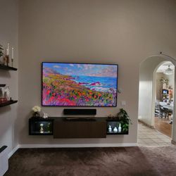 Pavey's Handyman Solutions - New 89 inch TV hung with entertainment center build. Handyman in Temecula!