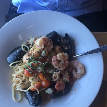 M'tucci's Moderno - Pasta with shrimp mussels and a saffron cream sauce - Italian Near Me - Rio Rancho, New Mexico M'tucci's Moderno - Pasta with shrimp mussels and a saffron cream sauce - Italian Near Me - Rio Rancho, New Mexico