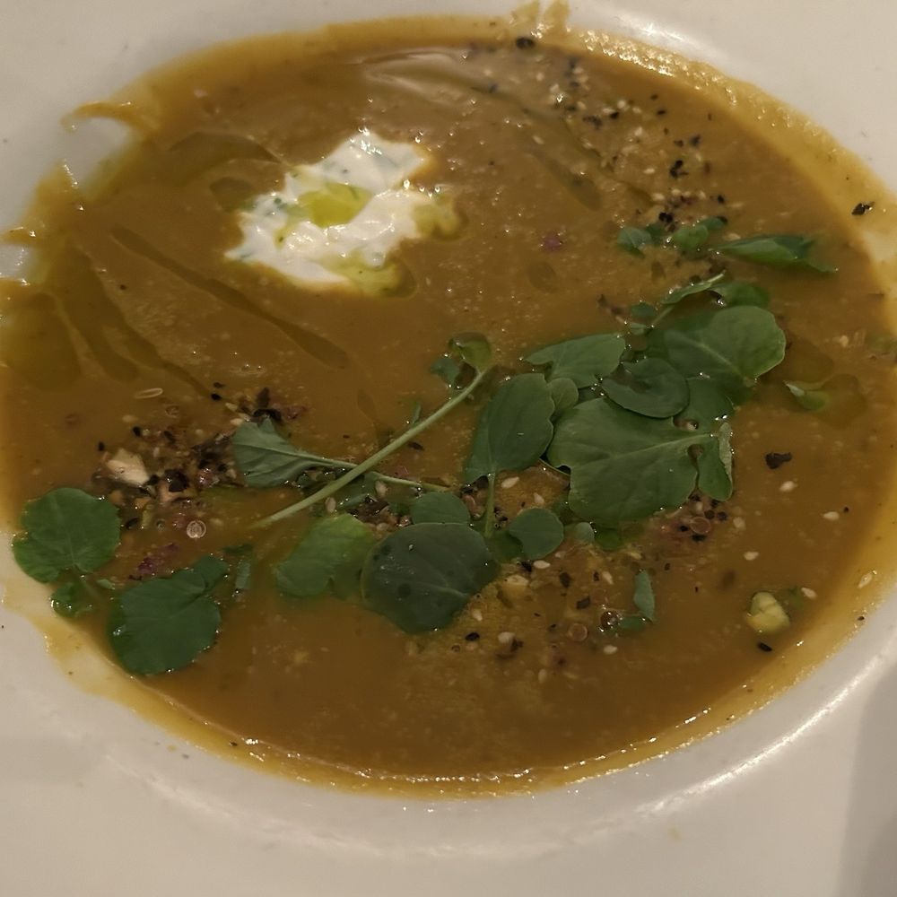 Hudson Clearwater - Vegan roasted squash soup, leeks, pistachio & pepita dukkah, herbed coconut yogurt - New American Near Me - New York, New York Hudson Clearwater - Vegan roasted squash soup, leeks, pistachio & pepita dukkah, herbed coconut yogurt - New American Near Me - New York, New York