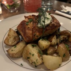The Feiring - Perfectly flaky & tender smoked salmon with dill compote, roasted potatoes and zucchini.