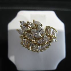 Lewco Gold & Silver Corp - 14kt yellow gold estate ring with baguette and marquee diamonds