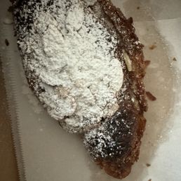 Burnt almond croissant, half the size and hard like rock candy.