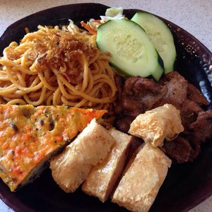 Photo of Thuan Kieu Noodle & Grill - Irvine, CA, United States. Garlic noodles, grilled pork, steamed quiche and fried tofu wrapped shrimp