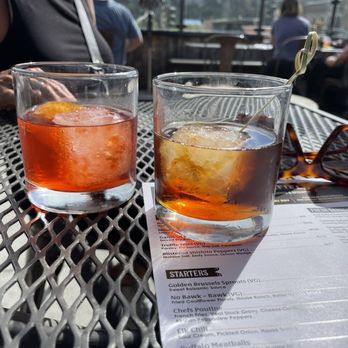 Warfield Distillery & Brewery - Negroni on a rock queen of Hearts cocktail - New American Near Me - Ketchum, Idaho Warfield Distillery & Brewery - Negroni on a rock queen of Hearts cocktail - New American Near Me - Ketchum, Idaho