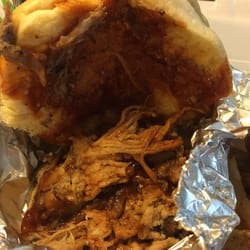 The Junction - Close-up of pulled pork sandwich