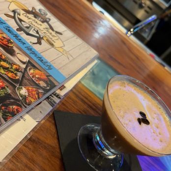 Captain Brad's Coastal Kitchen - Espresso martini at the bar watching oysters grill - Seafood Near Me - Tomball, Texas