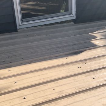 Ridge Top Exteriors - Seal taken out and siding taken off and never replaced leaving water to seep between house and shed roof. - Roofing Near Me - Appleton, Wisconsin