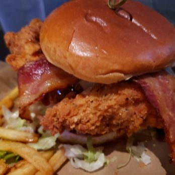 Buffalo Wild Wings - Close up of the chicken sandwich. The chicken was just as hard as the boneless wings - American Near Me - Honolulu, Hawaii Buffalo Wild Wings - Close up of the chicken sandwich. The chicken was just as hard as the boneless wings - American Near Me - Honolulu, Hawaii