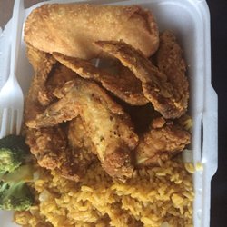 China Wok - Lemon pepper chicken wings with rice and egg roll . Yummmmmm .