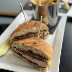 Black Cap Grille - Grilled chicken & prosciutto melt with house fries