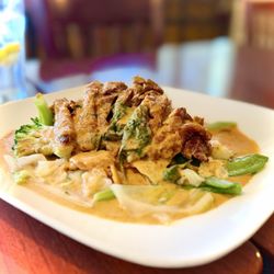 Thai Dish Restaurant - "Red curry Crispy Duck Thai HOT" it's not on the menu but they were kind enough to make it for moi OuiOui. Thank you so much.