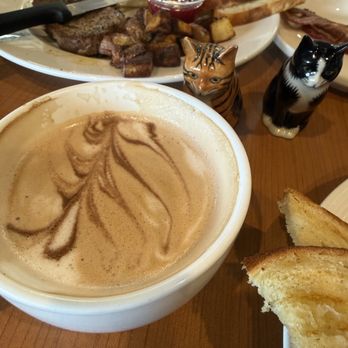 Alina’s Cafe - Are these cats making a move towards the mocha? (The cute salt & pepper shakers.) - Cafes Near Me - Des Moines, Washington