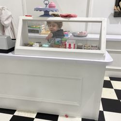 PeeknPlay - He was working in the ice cream shop. Lots of fun to be had.