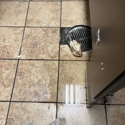 Water on floor like the toilet possibly overflowed. Not good. Water on floor like the toilet possibly overflowed. Not good.