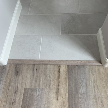 Affordable Flooring & More - Transition strip on the bedroom/bathroom floor. - Flooring Near Me - Las Vegas, Nevada Affordable Flooring & More - Transition strip on the bedroom/bathroom floor. - Flooring Near Me - Las Vegas, Nevada