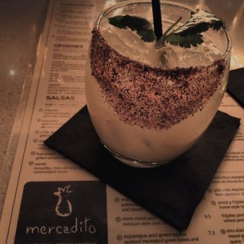 Mercadito - "little market" - a spicy/sweet cocktail made with herradura reposado, pineapple, chile guajillo, cilantro, and pico piquín - Mexican Near Me - Chicago, Illinois