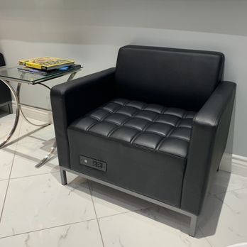 Premier Smiles Dentistry - Waiting chair with chargers - Cosmetic Dentists Near Me - Cypress, California Premier Smiles Dentistry - Waiting chair with chargers - Cosmetic Dentists Near Me - Cypress, California
