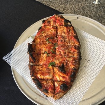 The Fire Pizza Company - a pizza on a plate - Caterers Near Me