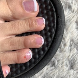 Bubbles in the polish and she cut my toe with the drill! Bubbles in the polish and she cut my toe with the drill!