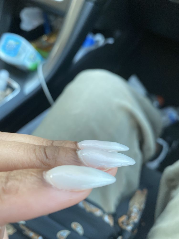 Nail Unique Logo