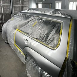 Post repair being blended with new coat.
