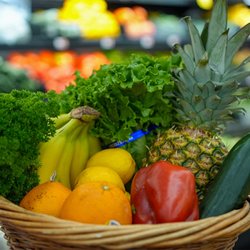 Organic grocery store with a basket full of produce