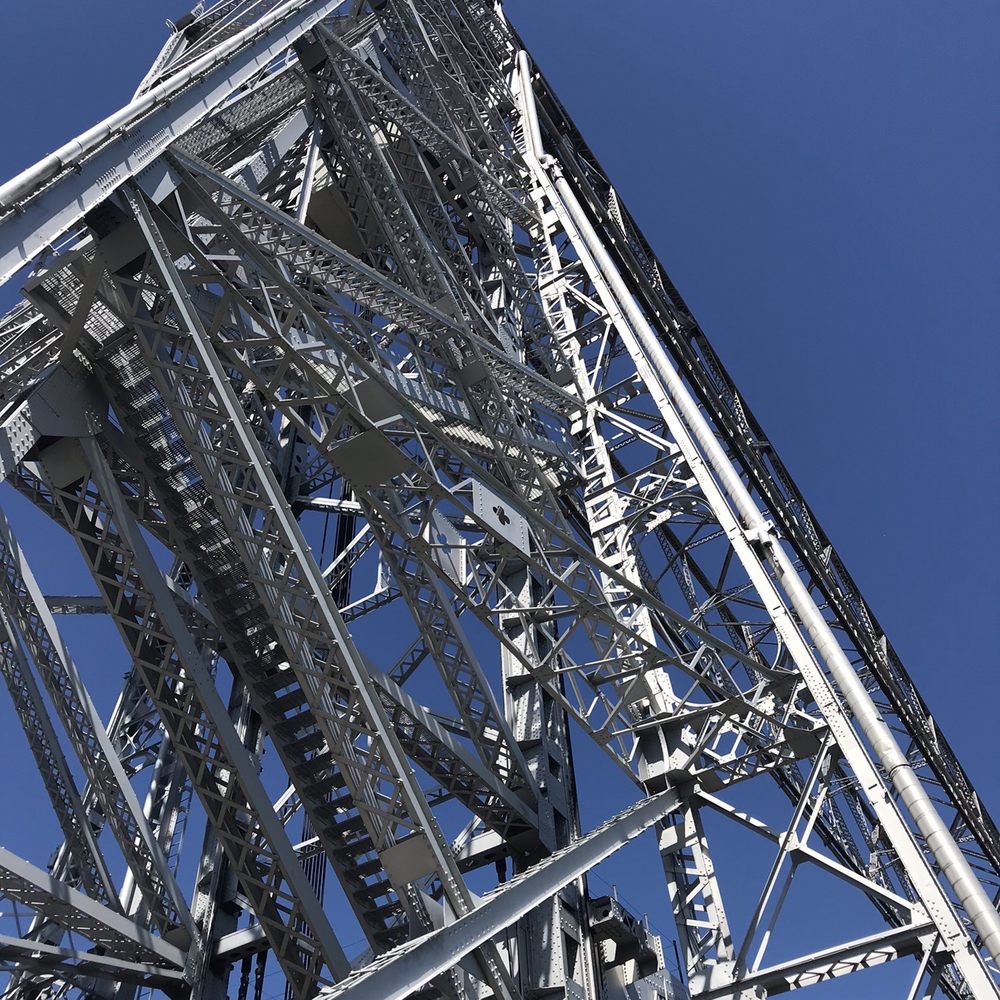 Aerial Lift Bridge - Looking up to the bridge. - Local Flavor Near Me - Duluth, Minnesota Aerial Lift Bridge - Looking up to the bridge. - Local Flavor Near Me - Duluth, Minnesota