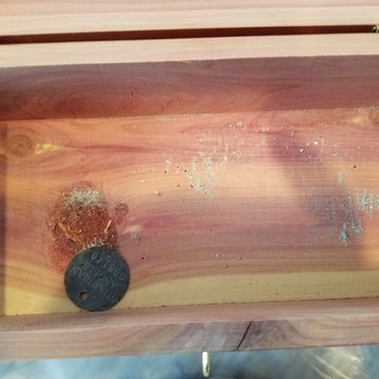 West Coast Pet Memorial - A closer view of ashes in the bottom of the box. The carelessness is horrifying. - Pet Cremation Services Near Me - Escondido, California West Coast Pet Memorial - A closer view of ashes in the bottom of the box. The carelessness is horrifying. - Pet Cremation Services Near Me - Escondido, California