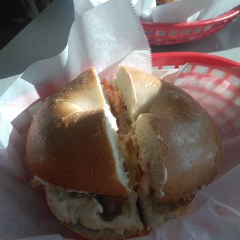Empire Deli & Bagel - This is what the girl called open face bagel. All she is concern is ringing the order. - Bagels Near Me - Wilmington, North Carolina Empire Deli & Bagel - This is what the girl called open face bagel. All she is concern is ringing the order. - Bagels Near Me - Wilmington, North Carolina