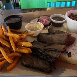 Brisket (large) with sauce, sweet potatoes fries and baked beans.  Delicious.  The pickles are homemade and are good.