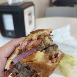 Brunch in a Box - Yes, that's right. You see two large patties, cheese, onions, tomato, lettuce.