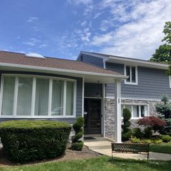 Michael Herman Aluminum Vinyl Siding - Certainteed Flagstone shake, Certainteed Adirondack Snowfall stone and Flagstone clapboard siding in Front in Plainview