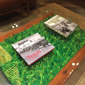 Cavalry Court, Valencia Hotel Collection - This is a table is made from army guys !  Clever ! - Hotels Near Me - College Station, Texas