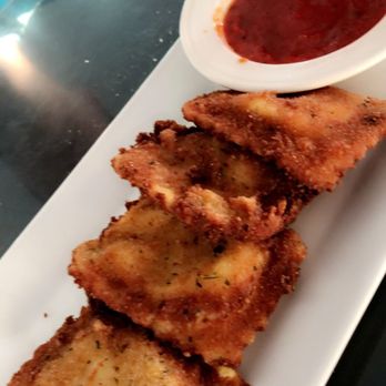 Toast - Appetizer.  Fried cheese ravioli.  Delicious!! - Pizza Near Me - Ocean City, Maryland
