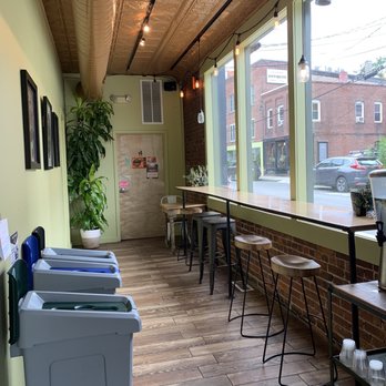 Nourish Wellness Cafe - Bar seating, lush with plants and compost centric trash system - Juice Bars & Smoothies Near Me - Northampton, Massachusetts Nourish Wellness Cafe - Bar seating, lush with plants and compost centric trash system - Juice Bars & Smoothies Near Me - Northampton, Massachusetts