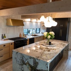 Remcon Design Build - Opened up walls to have an open concept kitchen and island