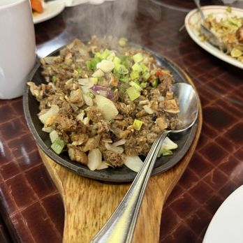 Uncle’s Tapas Bar & Grill - Pork sizzling sisig - Filipino Near Me - Las Vegas, Nevada Uncle’s Tapas Bar & Grill - Pork sizzling sisig - Filipino Near Me - Las Vegas, Nevada