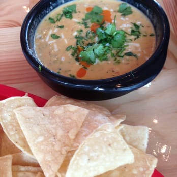 Torchy's Tacos - Green chile queso & chips - Tex-Mex Near Me - Houston, Texas Torchy's Tacos - Green chile queso & chips - Tex-Mex Near Me - Houston, Texas