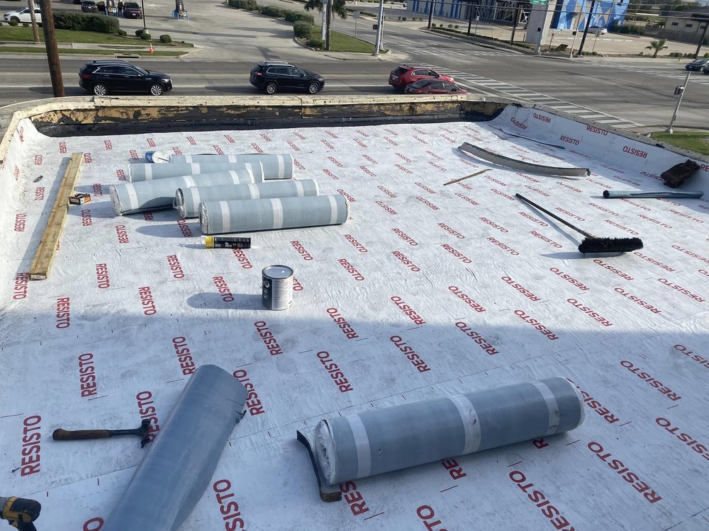 Slide of A Banda M Roofing