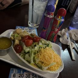 Side salad and a Tito's and lemonade Side salad and a Tito's and lemonade