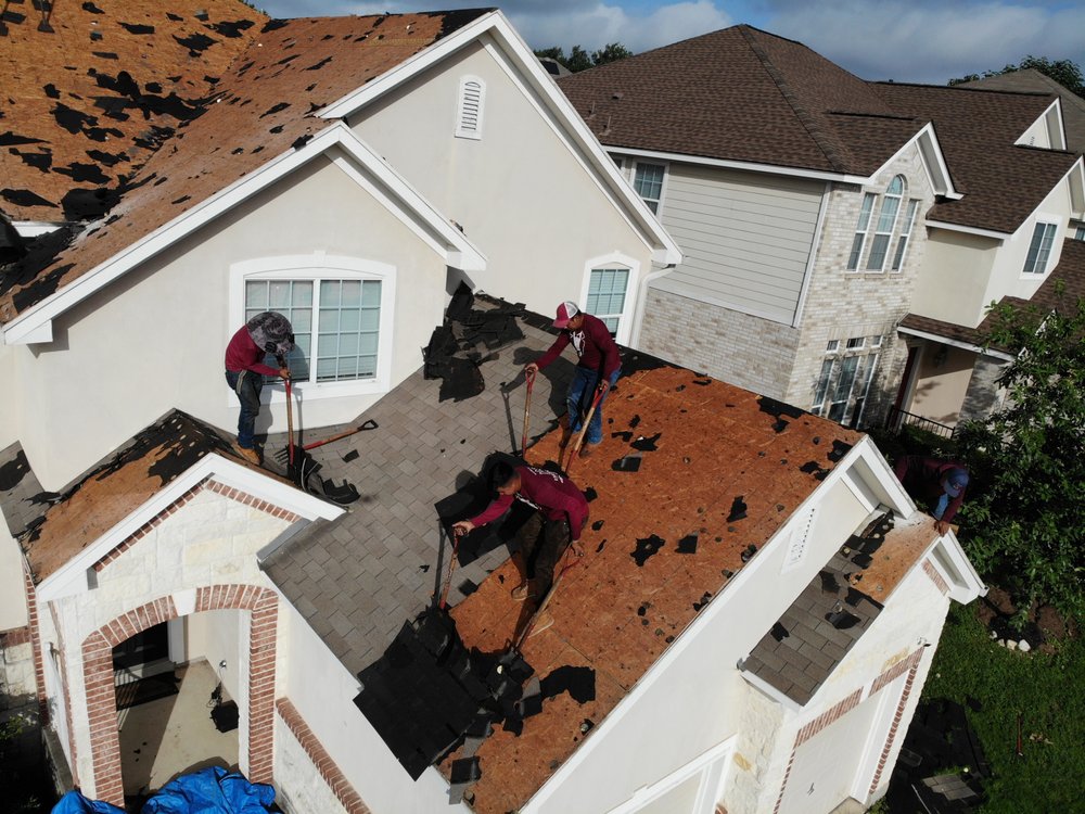 Slide of Tux Roofing